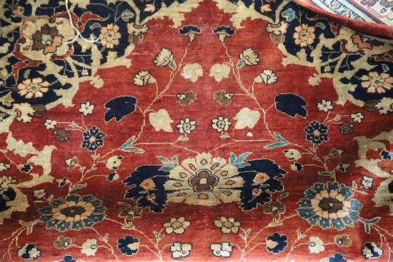 A Tabriz silk rug, 5ft 9in by 4ft 6in.